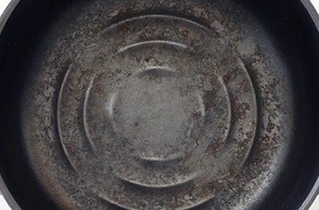 What Is the Black Residue on My Cast-Iron Pan?